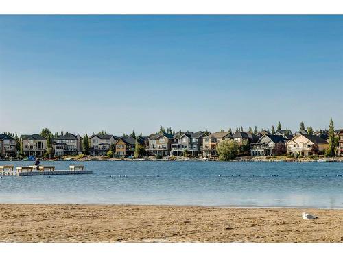 73 Crystal Shores Crescent, Okotoks, AB - Outdoor With Body Of Water With View