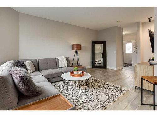 73 Crystal Shores Crescent, Okotoks, AB - Indoor Photo Showing Living Room