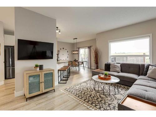 73 Crystal Shores Crescent, Okotoks, AB - Indoor Photo Showing Living Room