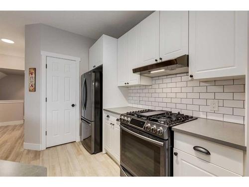 73 Crystal Shores Crescent, Okotoks, AB - Indoor Photo Showing Kitchen With Stainless Steel Kitchen With Upgraded Kitchen