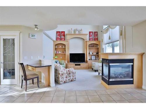 4642 Hamptons Way Nw, Calgary, AB - Indoor With Fireplace