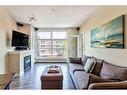 320-315 24 Avenue Sw, Calgary, AB  - Indoor Photo Showing Living Room With Fireplace 