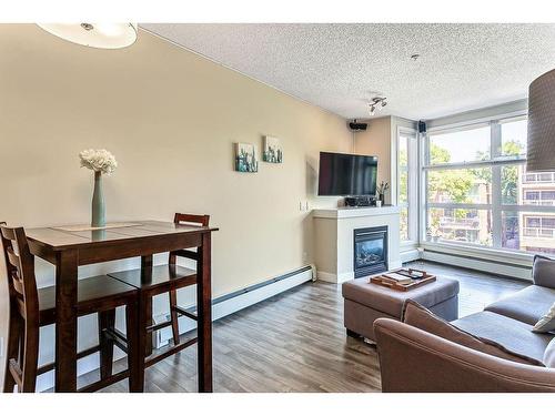 320-315 24 Avenue Sw, Calgary, AB - Indoor With Fireplace