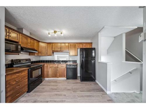 90 Copperfield Court Se, Calgary, AB - Indoor Photo Showing Kitchen