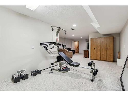 2 Wellington Cove, Strathmore, AB - Indoor Photo Showing Gym Room