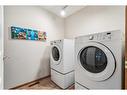 2 Wellington Cove, Strathmore, AB  - Indoor Photo Showing Laundry Room 