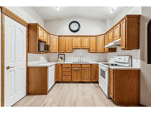 2 Wellington Cove, Strathmore, AB - Indoor Photo Showing Kitchen With Double Sink