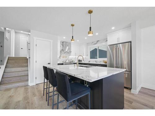 12551 Cannington Way Sw, Calgary, AB - Indoor Photo Showing Kitchen With Upgraded Kitchen