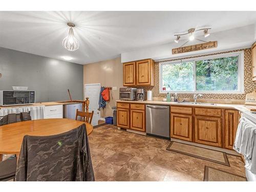 97 Fielding Drive Se, Calgary, AB - Indoor Photo Showing Kitchen With Double Sink