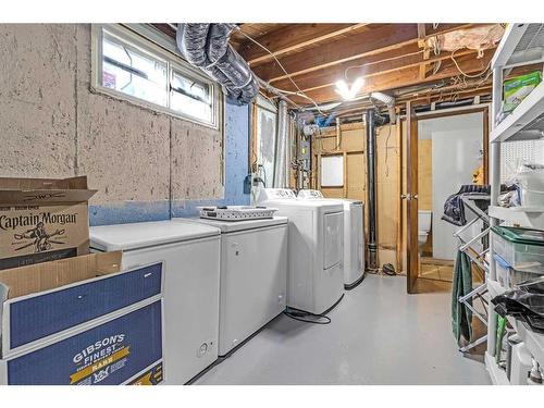 97 Fielding Drive Se, Calgary, AB - Indoor Photo Showing Laundry Room