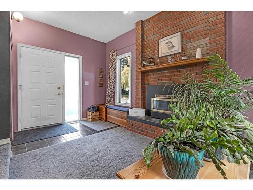 97 Fielding Drive Se, Calgary, AB - Indoor Photo Showing Other Room With Fireplace