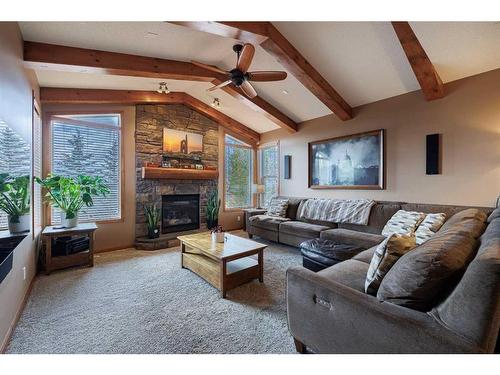 35 Tuscany Reserve Court Nw, Calgary, AB - Indoor Photo Showing Living Room With Fireplace