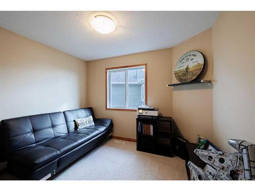 35 Tuscany Reserve Court Nw, Calgary, AB - Indoor Photo Showing Living Room