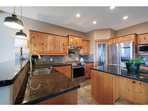 35 Tuscany Reserve Court Nw, Calgary, AB - Indoor Photo Showing Kitchen With Stainless Steel Kitchen With Double Sink