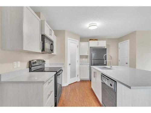 2101-2781 Chinook Winds Drive Sw, Airdrie, AB - Indoor Photo Showing Kitchen