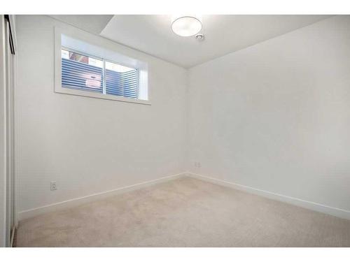 225 Creekside Drive Sw, Calgary, AB - Indoor Photo Showing Other Room