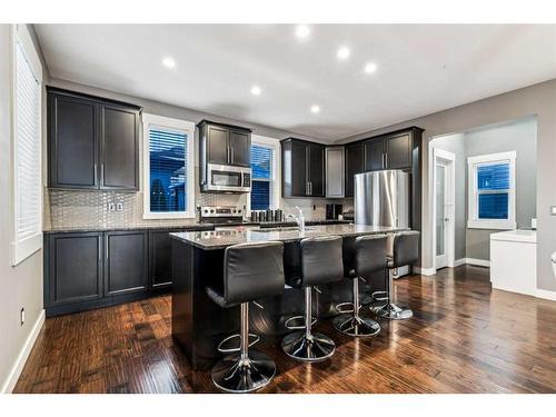 217 Rainbow Falls Glen, Chestermere, AB - Indoor Photo Showing Kitchen With Stainless Steel Kitchen With Upgraded Kitchen