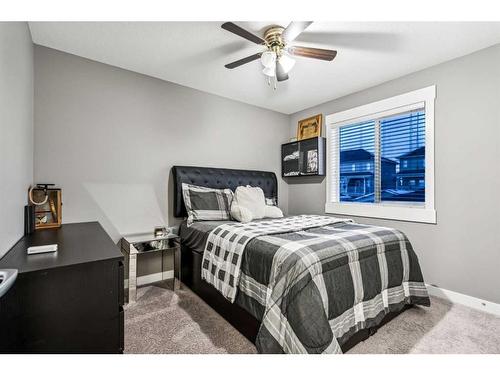 217 Rainbow Falls Glen, Chestermere, AB - Indoor Photo Showing Bedroom