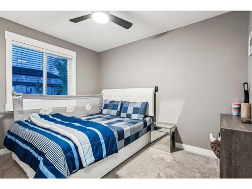 217 Rainbow Falls Glen, Chestermere, AB - Indoor Photo Showing Bedroom