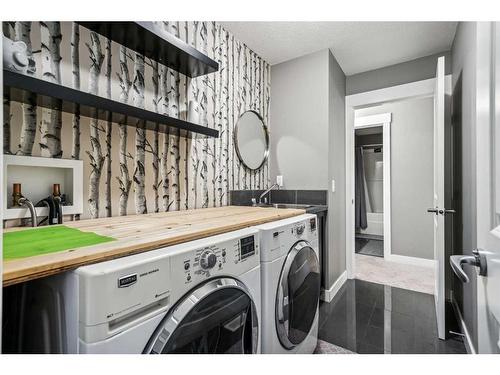 217 Rainbow Falls Glen, Chestermere, AB - Indoor Photo Showing Laundry Room