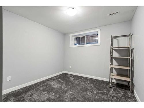 217 Rainbow Falls Glen, Chestermere, AB - Indoor Photo Showing Other Room