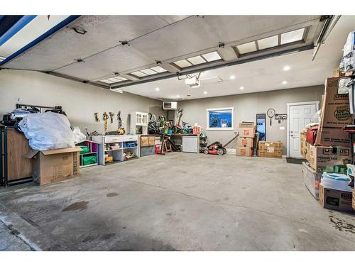 217 Rainbow Falls Glen, Chestermere, AB - Indoor Photo Showing Garage