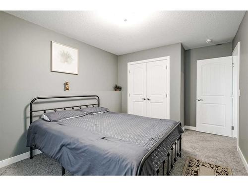 32 Legacy Cove Se, Calgary, AB - Indoor Photo Showing Bedroom