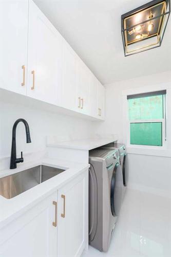 76 Sunvalley Way, Cochrane, AB - Indoor Photo Showing Laundry Room