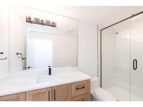 76 Sunvalley Way, Cochrane, AB - Indoor Photo Showing Bathroom