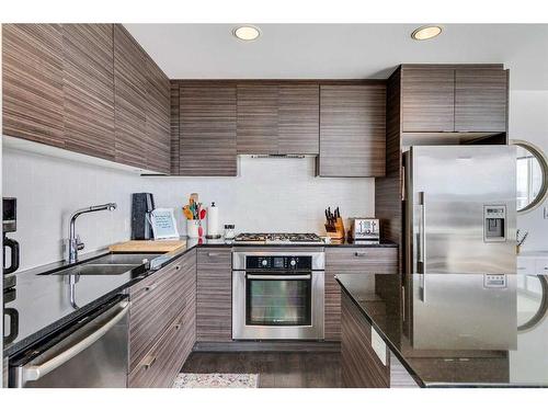 1702-1500 7 Street Sw, Calgary, AB - Indoor Photo Showing Kitchen With Stainless Steel Kitchen With Double Sink With Upgraded Kitchen