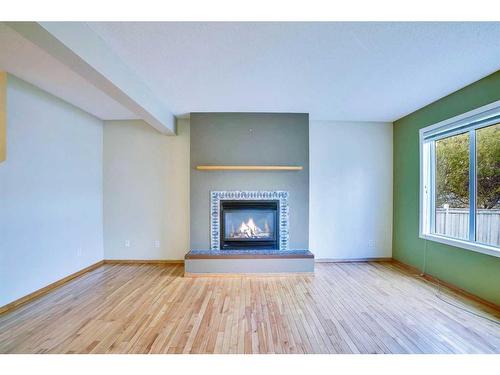 26 Citadel Peak Calgary Mews Nw, Calgary, AB - Indoor Photo Showing Living Room With Fireplace