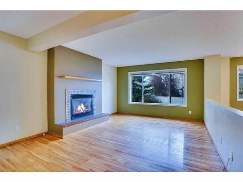 26 Citadel Peak Mews Nw, Calgary, AB - Indoor Photo Showing Living Room With Fireplace