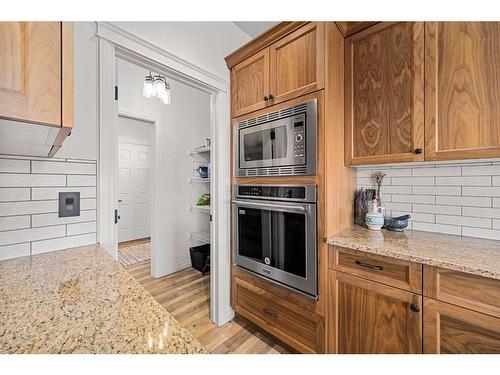 30 Riviera View South, Cochrane, AB - Indoor Photo Showing Kitchen