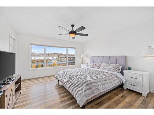 30 Riviera View South, Cochrane, AB - Indoor Photo Showing Bedroom