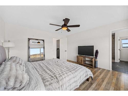 30 Riviera View South, Cochrane, AB - Indoor Photo Showing Bedroom