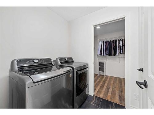 30 Riviera View South, Cochrane, AB - Indoor Photo Showing Laundry Room