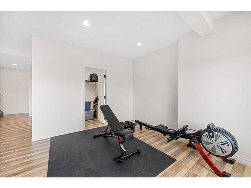 30 Riviera View South, Cochrane, AB - Indoor Photo Showing Gym Room