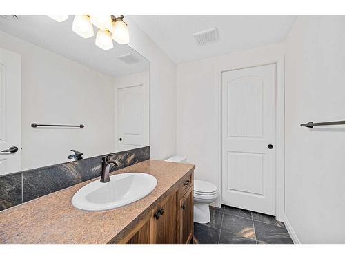 30 Riviera View South, Cochrane, AB - Indoor Photo Showing Bathroom