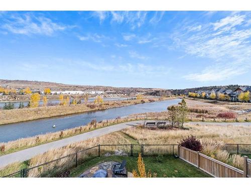 30 Riviera View South, Cochrane, AB - Outdoor With Body Of Water With View