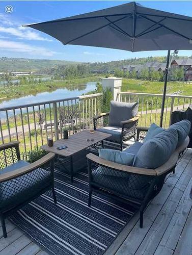 30 Riviera View South, Cochrane, AB - Outdoor With Deck Patio Veranda With View With Exterior