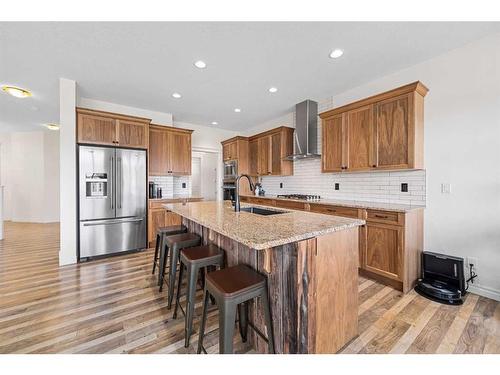 30 Riviera View South, Cochrane, AB - Indoor Photo Showing Kitchen With Stainless Steel Kitchen