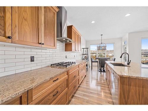 30 Riviera View South, Cochrane, AB - Indoor Photo Showing Kitchen With Upgraded Kitchen