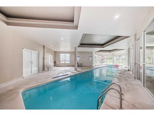 4-121 Village Heights Sw, Calgary, AB - Indoor Photo Showing Other Room With In Ground Pool