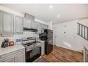 56 Saddletree Court Ne, Calgary, AB  - Indoor Photo Showing Kitchen 