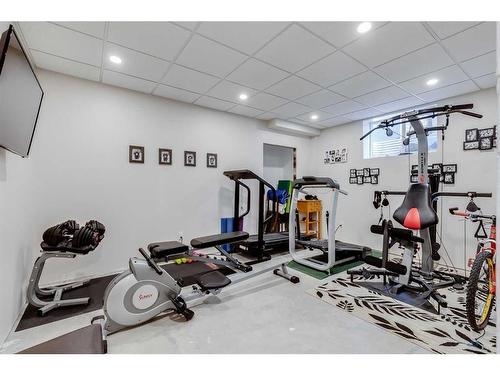 39 Rockcliff Landing Nw, Calgary, AB - Indoor Photo Showing Gym Room