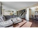 39 Rockcliff Landing Nw, Calgary, AB  - Indoor Photo Showing Living Room 