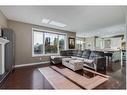 39 Rockcliff Landing Nw, Calgary, AB  - Indoor Photo Showing Living Room 