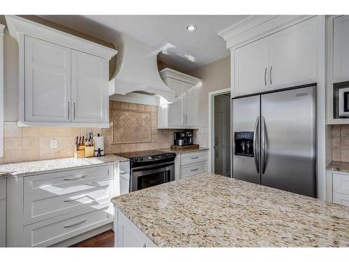 39 Rockcliff Landing Nw, Calgary, AB - Indoor Photo Showing Kitchen With Stainless Steel Kitchen With Upgraded Kitchen