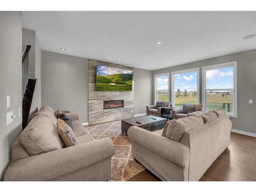 134 Red Sky Green Ne, Calgary, AB - Indoor Photo Showing Living Room With Fireplace