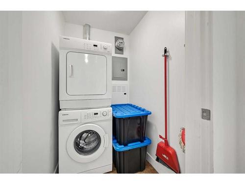 1906-8880 Horton Road Sw, Calgary, AB - Indoor Photo Showing Laundry Room